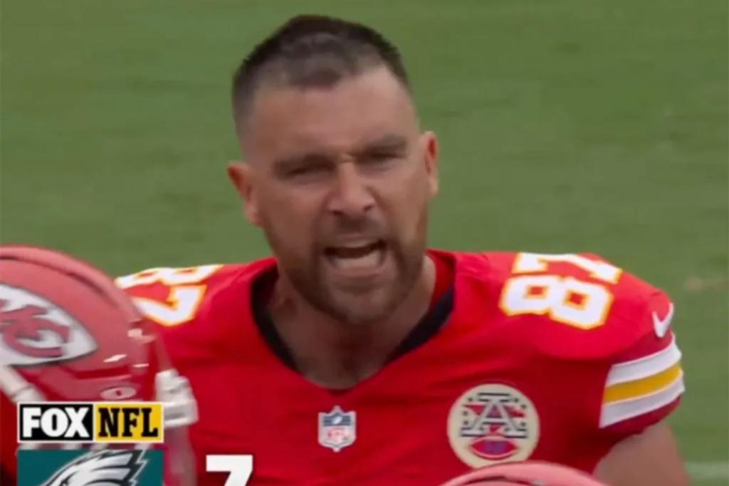Travis Kelce reacts angrily on the sidelines after a loss
