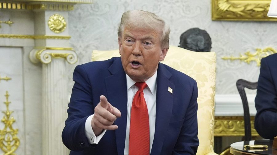 Trump tells reporter to get a new job over Putin question