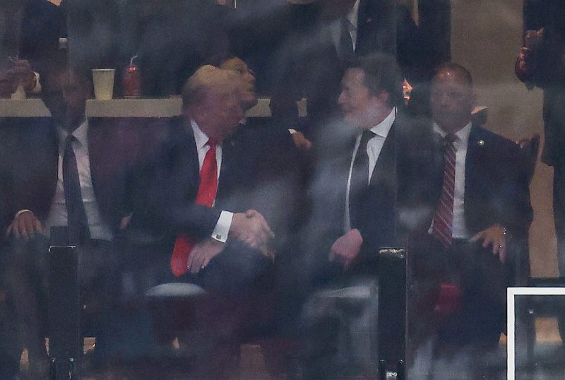 Trump and Musk meet again at Kirk Memorial, with a lip reader analyzing their interaction.