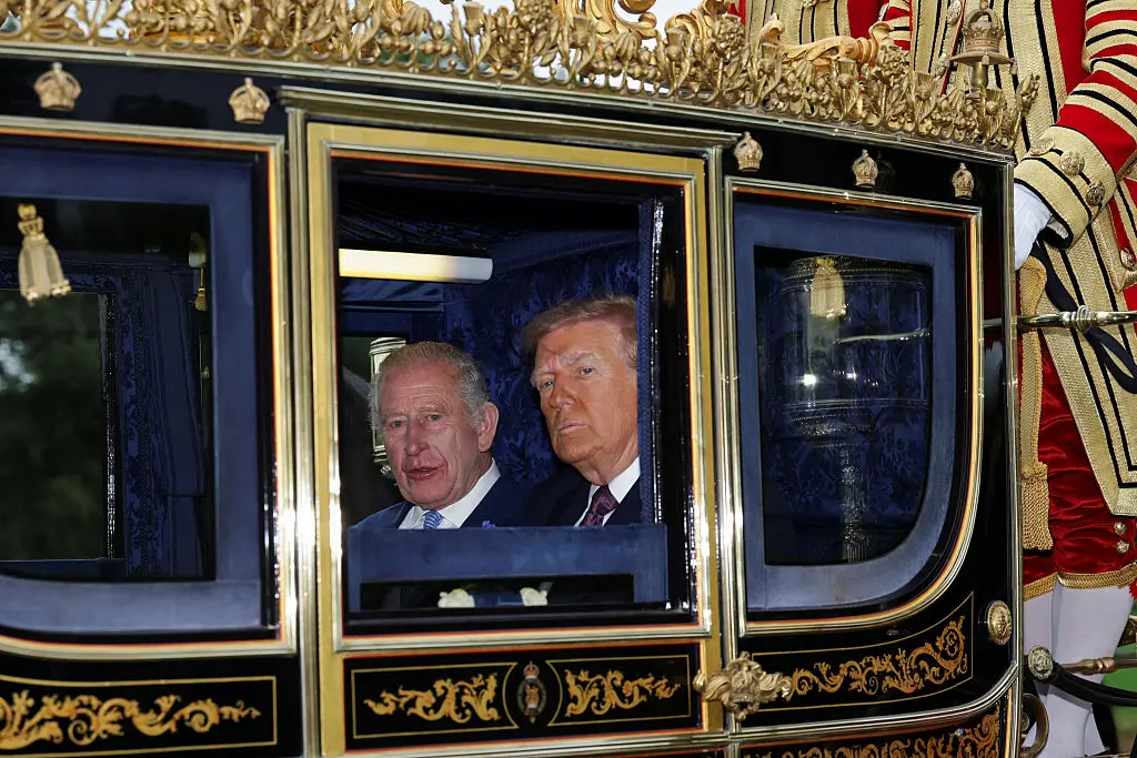 Trump and the First Lady take a carriage ride with their Majesties to Windsor Castle