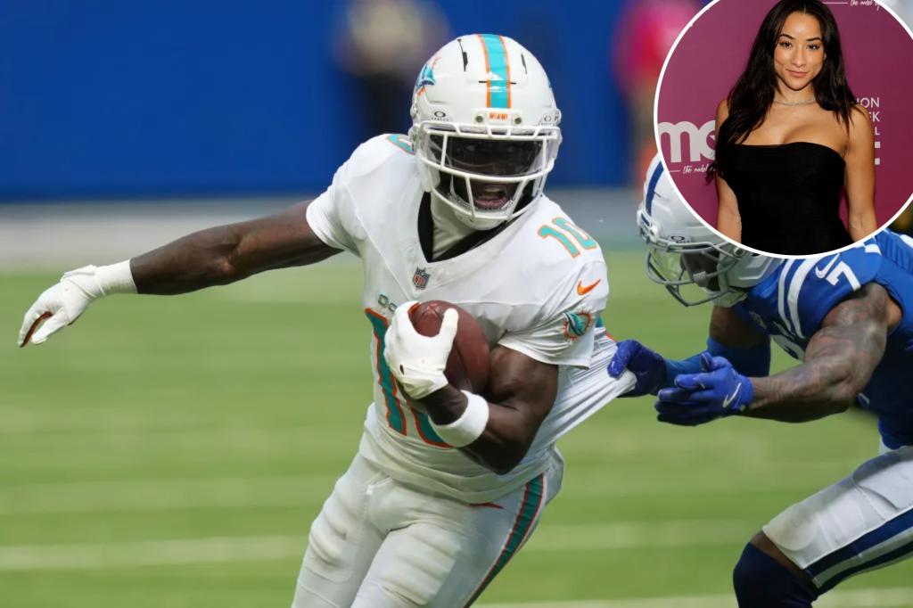 Tyreek Hill focuses on 'playing football' despite domestic abuse claims.