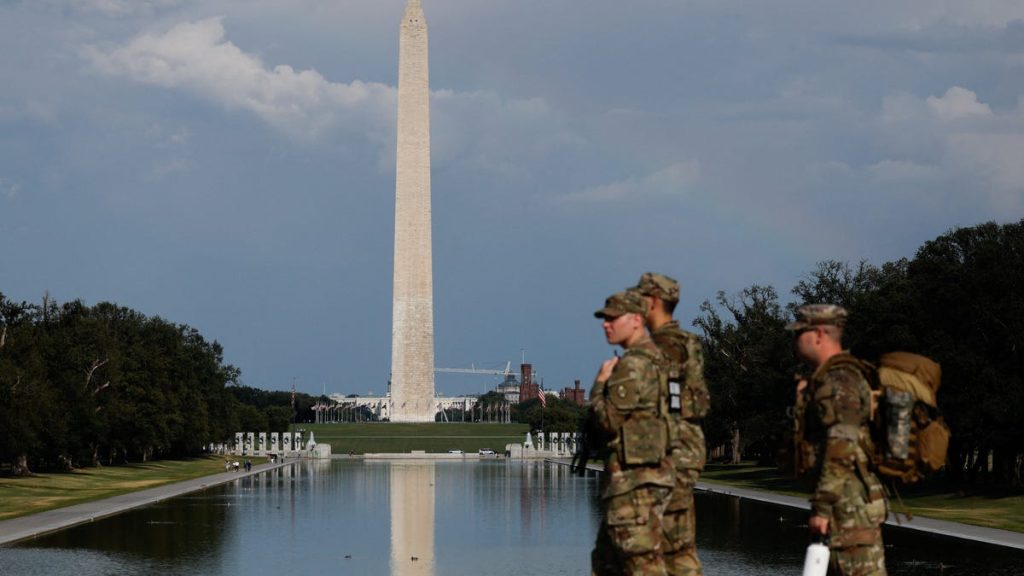 What is the reason behind the gold statue of Trump holding Bitcoin in DC? Here's what we know.