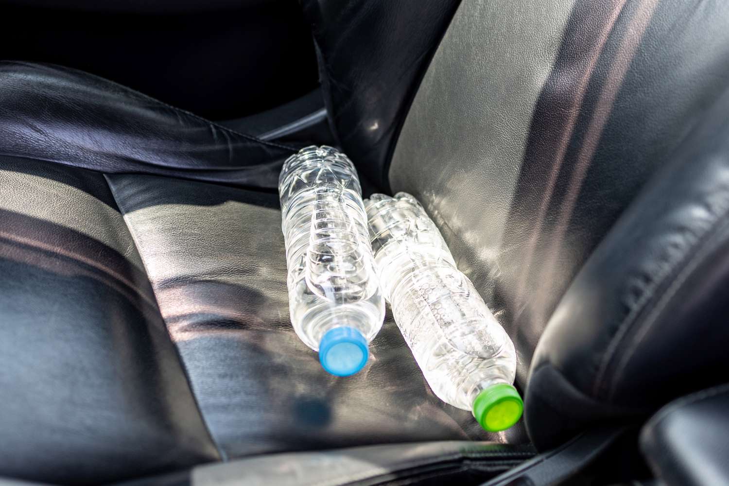 What occurs if you leave a plastic water bottle in a hot vehicle?