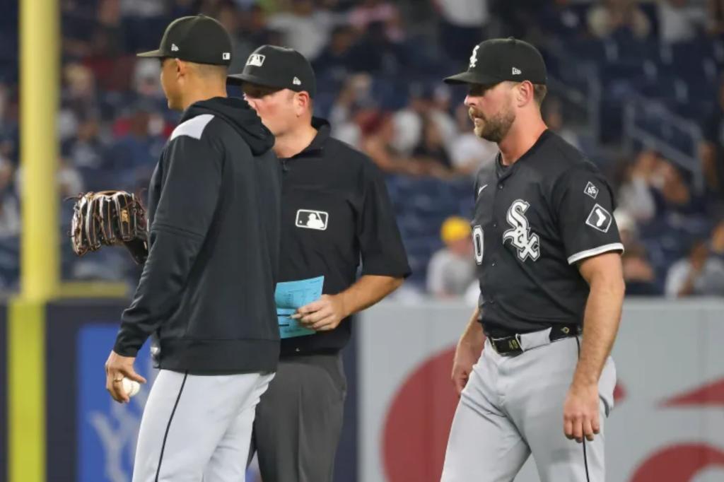 White Sox pitcher needs to switch gloves following umpire's check.