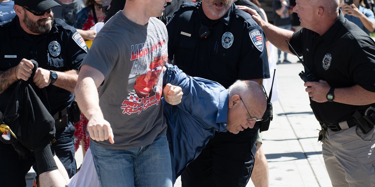 Who is the 71-year-old man taken into custody following the Charlie Kirk shooting who authorities claim is not a suspect?