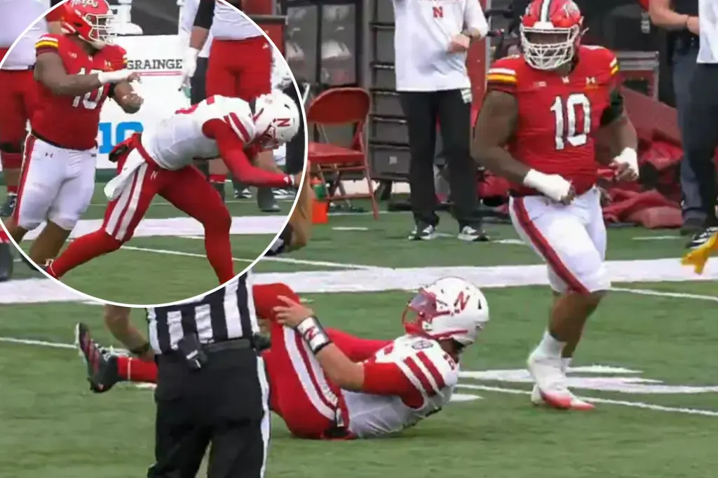 Fans are upset after Maryland's Cam Rice hits injured Nebraska QB Dylan Raiola.