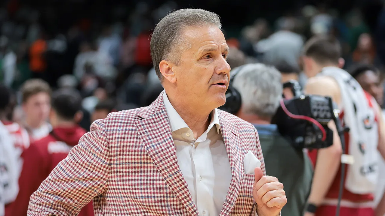 John Calipari moved from Kentucky to Arkansas after speaking with a priest.