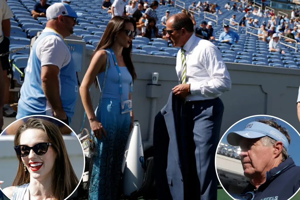 Jordon Hudson talks with ACC commissioner before UNC defeat