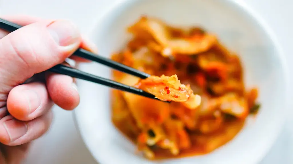 Kimchi might reduce blood pressure and triglycerides, research reveals, but there's a downside.