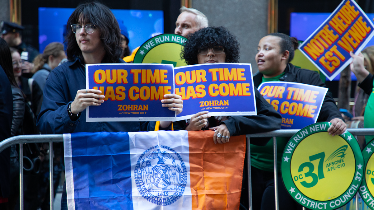 Mayoral candidates in NYC debate while their supporters gather outside the venue