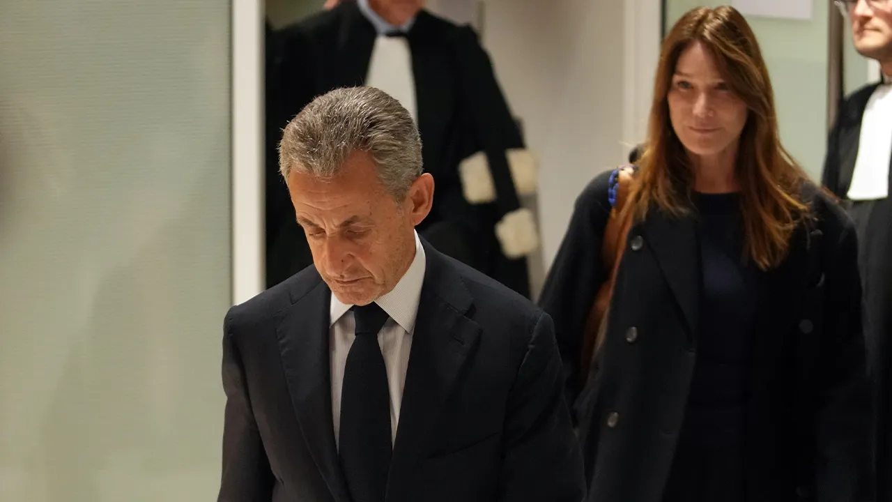 Nicolas Sarkozy arrives at a prison in Paris after being convicted for financing his campaign with Libyan funds.