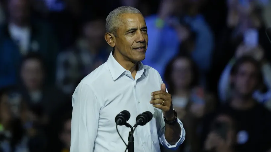 Obama knocks law firms, businesses that have made deals with Trump