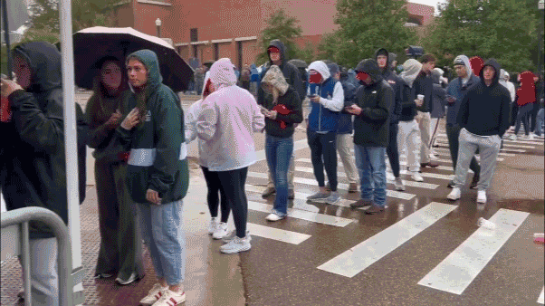 Ole Miss students wait in the rain for JD Vance and Erika Kirk's visit to campus with TPUSA