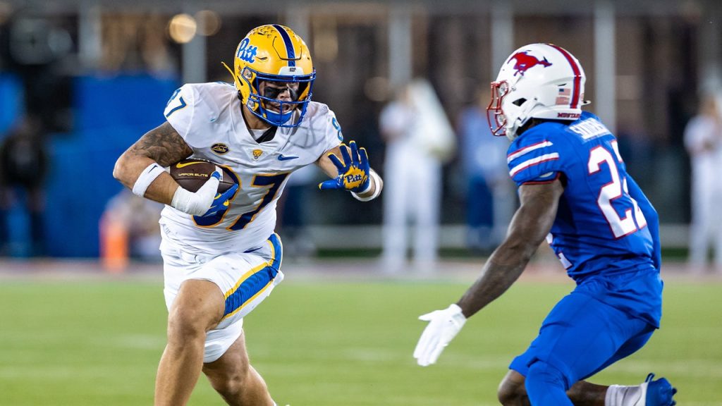 Pitt football players lead 'Pitt for Jesus' event, attracting hundreds and resulting in baptisms.