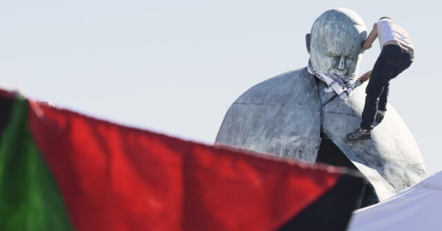 Pope John Paul II Statue Vandalized by Pro-Palestine Demonstrators