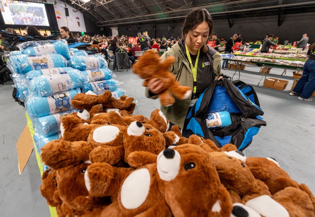 Redwood Credit Union staff assemble 4,000 care bags for local foster youth during Day of Impact