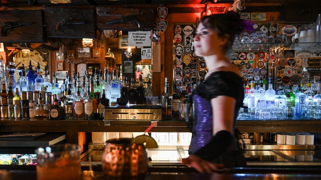 Top dive bars in America characterized by history, wear, and affordable drinks