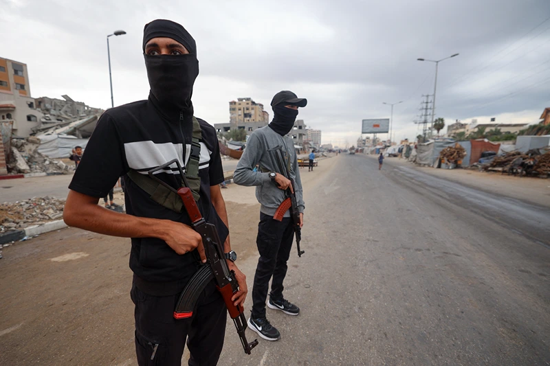 Trump insists Hamas must disarm or "we will disarm them" as delicate ceasefire agreement enters second phase