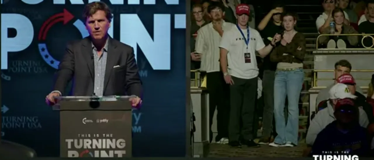Tucker Carlson Educates TPUSA Event Attendee Who Claims Trump Poop Meme Poses a Risk to Free Speech