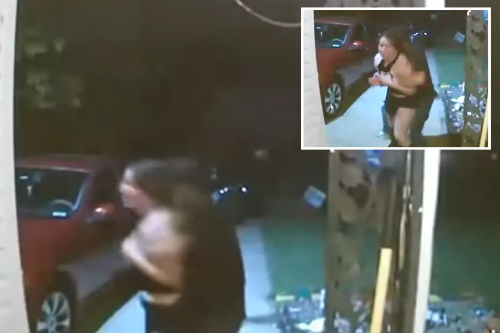 Woman located unharmed after video displays her yelling during a possible abduction outside a Kansas residence.