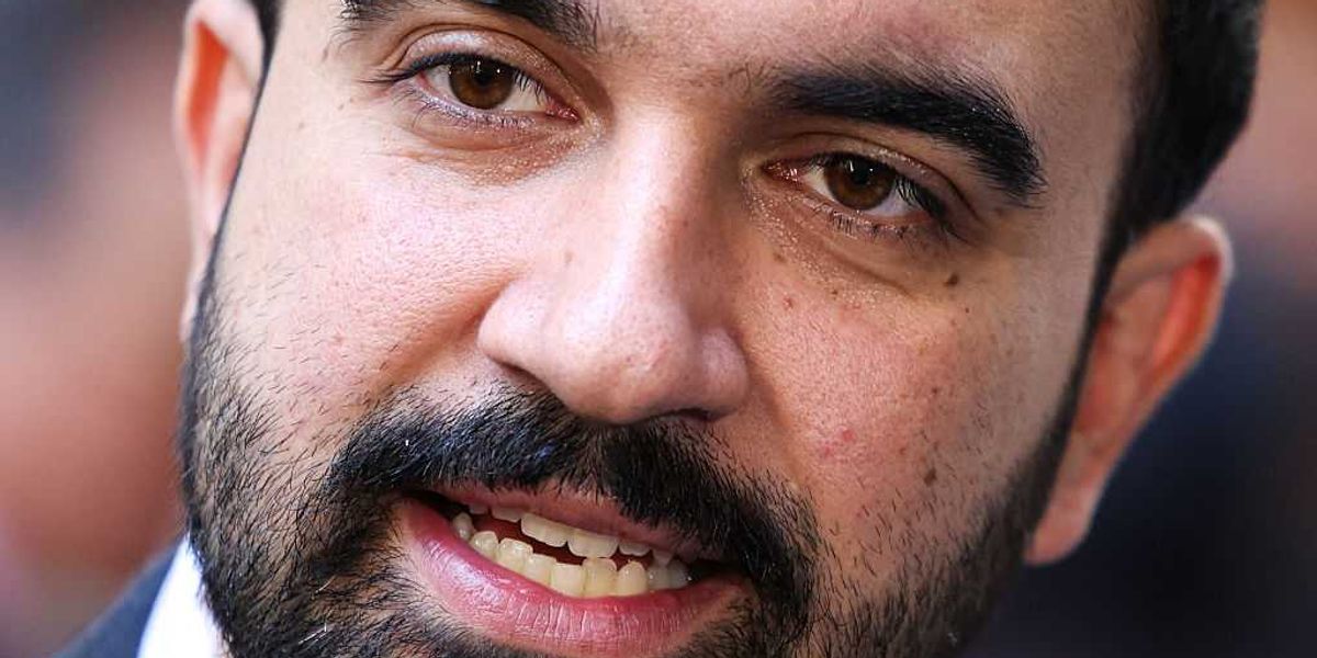 Zohran Mamdani, an LGBTQ advocate, faces criticism for a photo with a Ugandan lawmaker opposed to homosexuality.