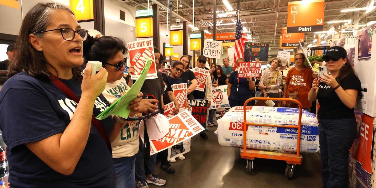 Activists against ICE disrupt Home Depot's business activities with an ice-scraper demonstration.