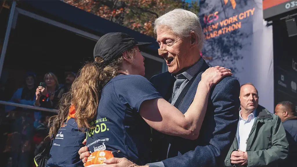 Bill Clinton seen with a bandage on his nose at the finish line of the NYC Marathon