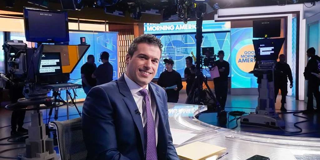 Bishop causes a stir after a progressive priest permits a gay ABC broadcaster to take Communion next to his 'husband'