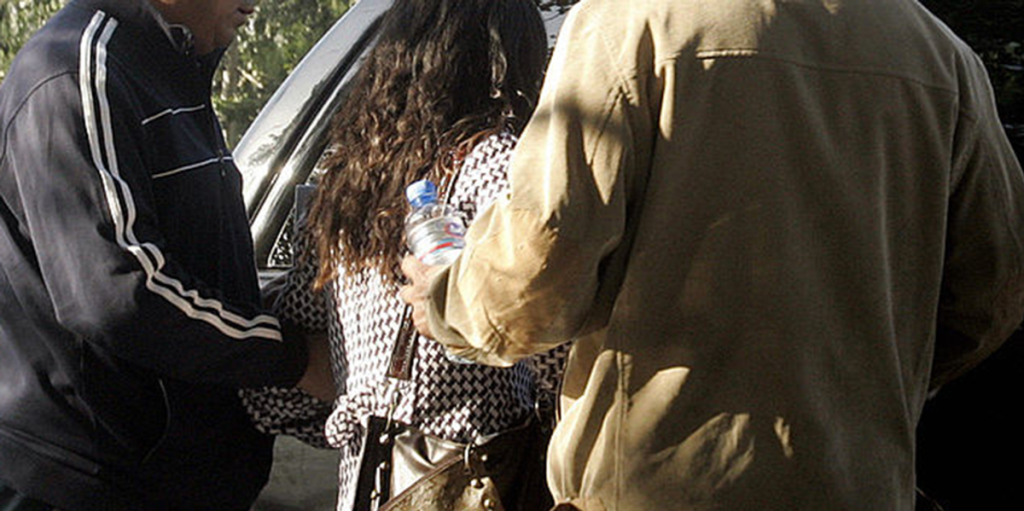 Bitcoin billionaire faces imprisonment after British police raided her home and took her into custody while she was in bed.