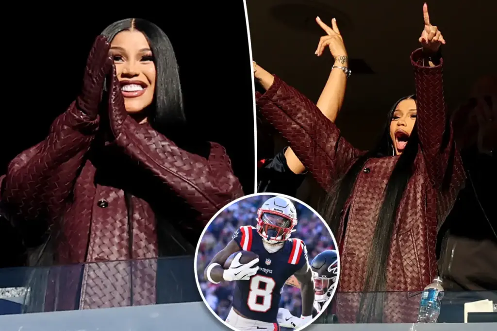 Cardi B gets excited while supporting her boyfriend Stefon Diggs at the Patriots-Falcons game during her pregnancy.