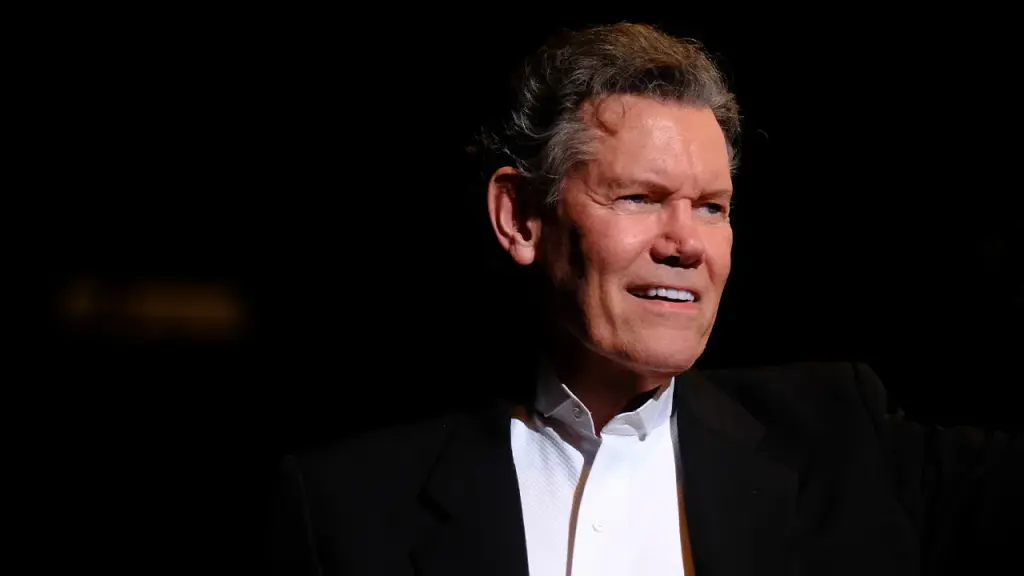 Country singer Randy Travis shares holiday music 12 years post-stroke.