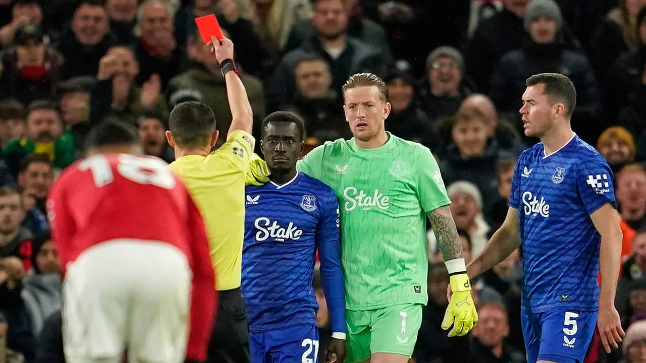 Everton player dismissed for hitting teammate