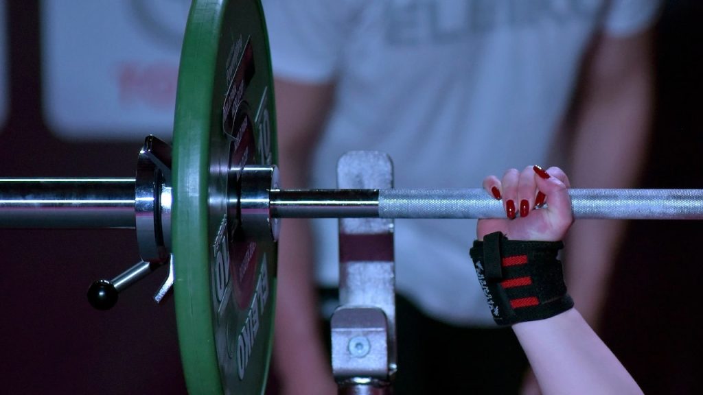 Female weightlifters share their experiences of unexpectedly competing against a trans athlete