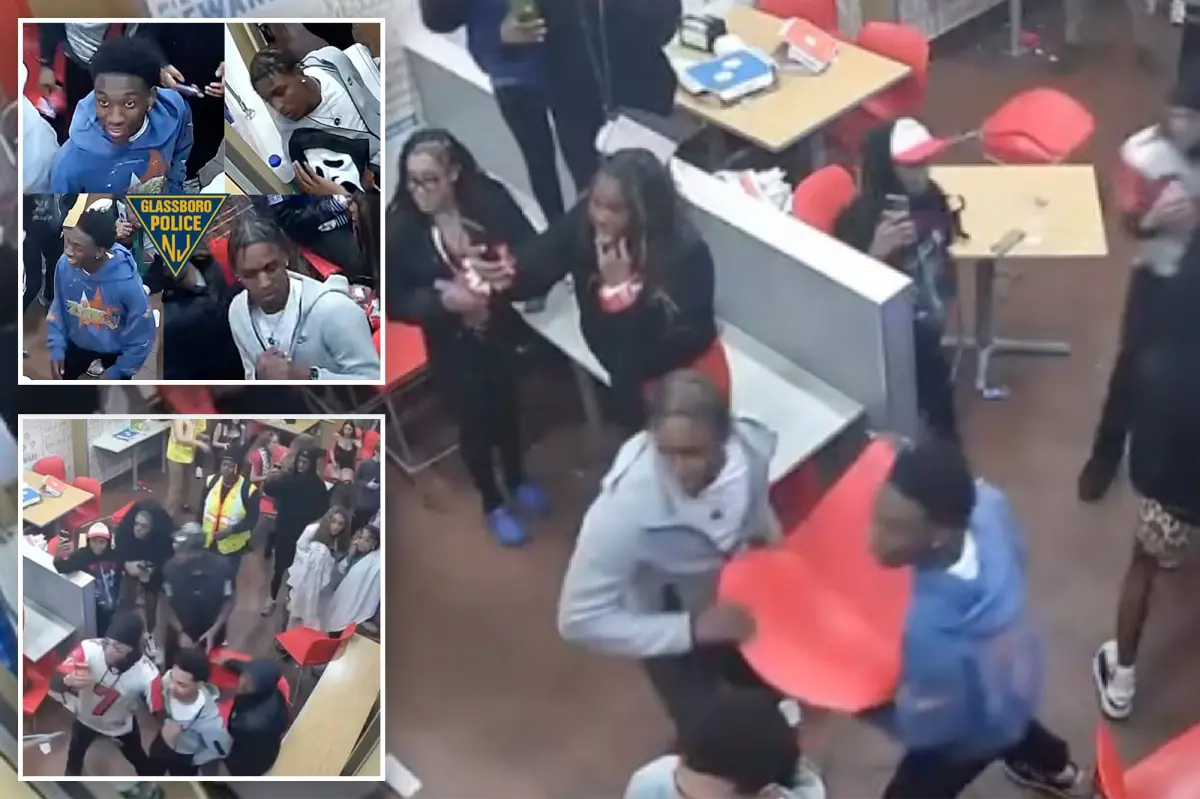 Fight breaks out at Domino's as suspects throw chair and hit officer.