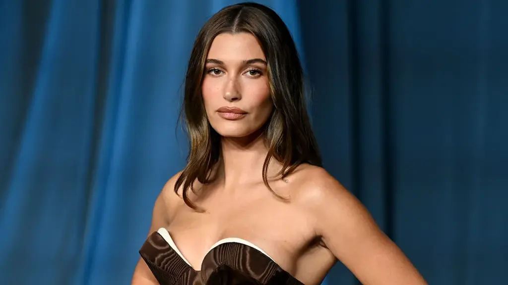 Hailey Bieber shares how motherhood has enhanced her spirituality in an interview.