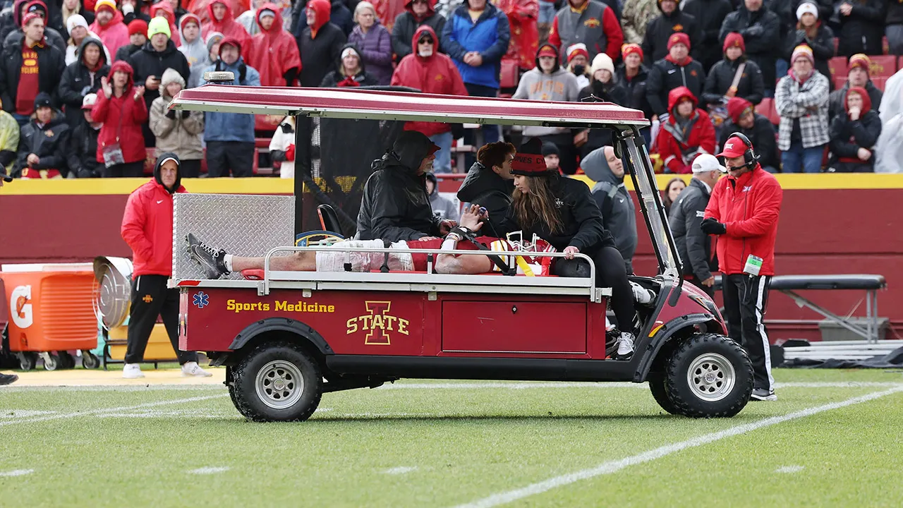 Iowa State's Benjamin Brahmer taken away by ambulance and admitted to the hospital after troubling fall