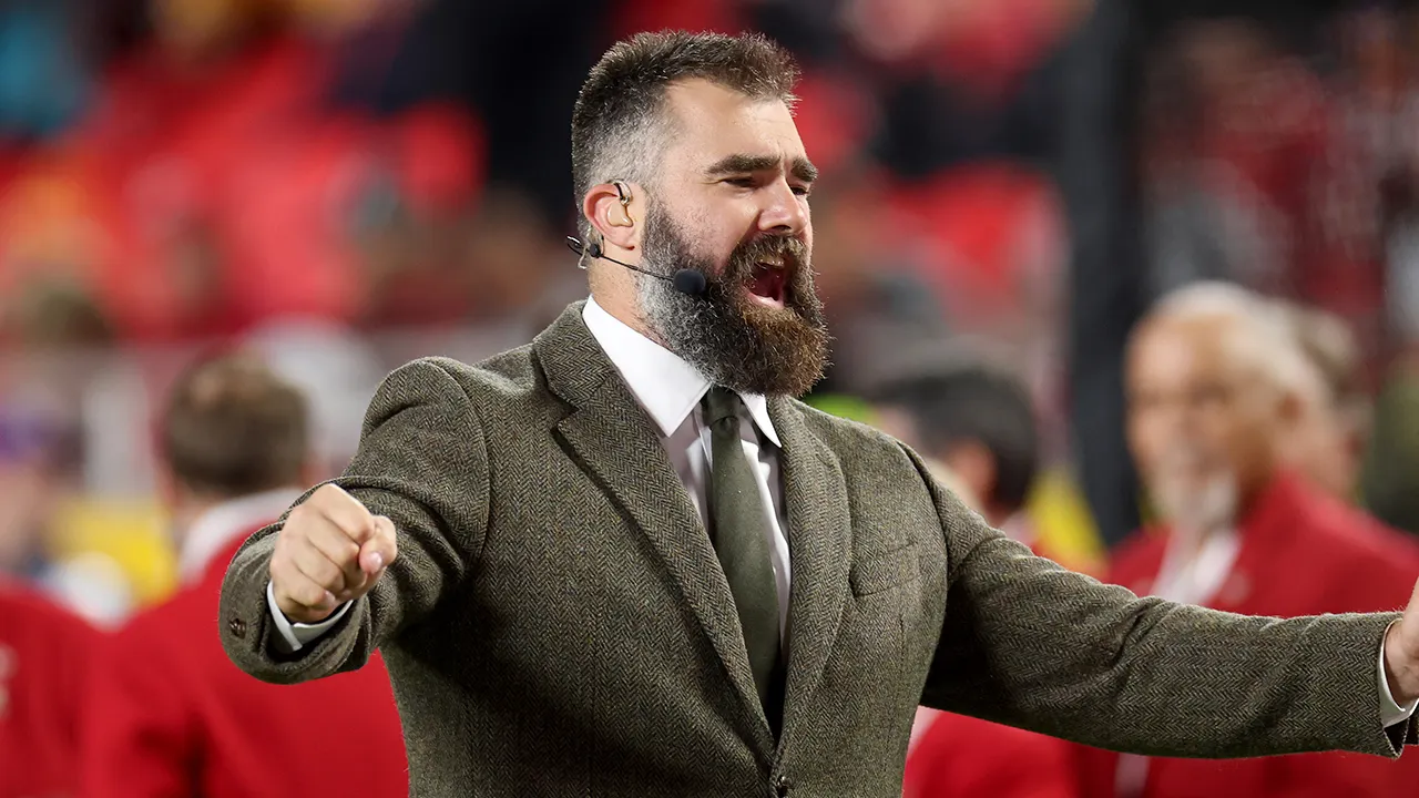 Jason Kelce participates shirtless in a belly-bucking contest ahead of the Eagles game.