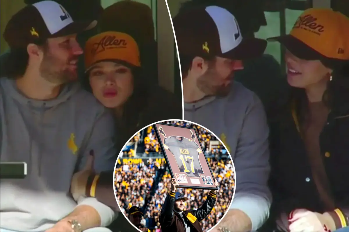 Josh Allen and Hailee Steinfeld share a warm moment at the quarterback's jersey retirement event