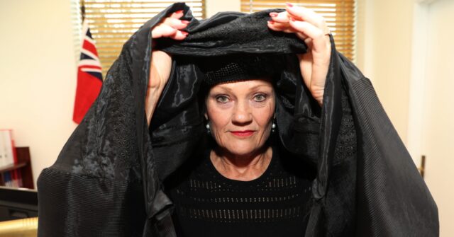 Lawmaker Suspended for 'Clear Racism' During Burqa Protest