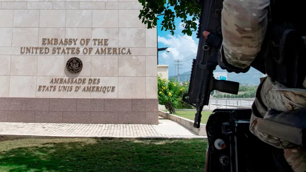 Marines guarding the U.S. Embassy in Haiti respond with gunfire at suspected gang members