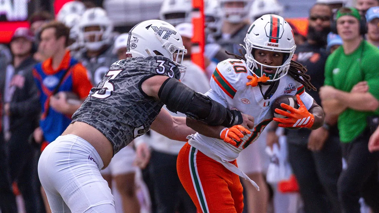 Miami football staff member narrowly escapes danger