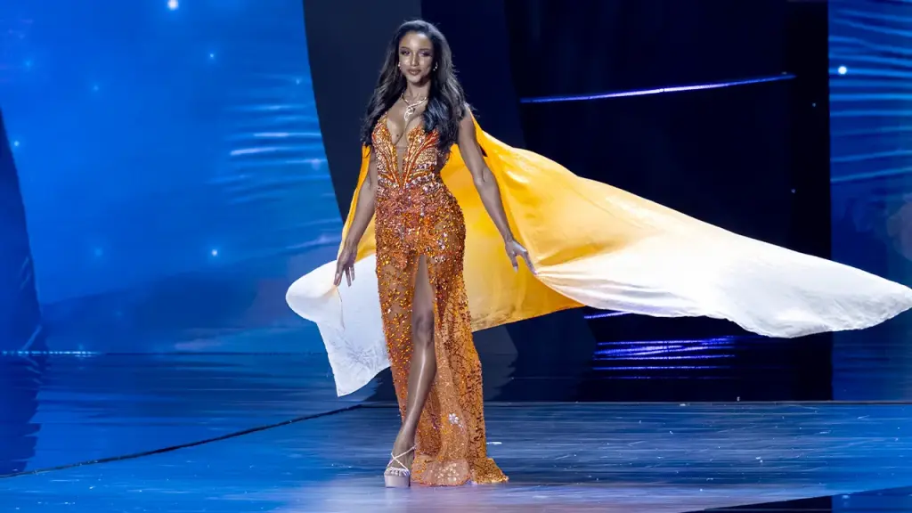 Miss Jamaica stumbles off stage during the Miss Universe contest in Thailand