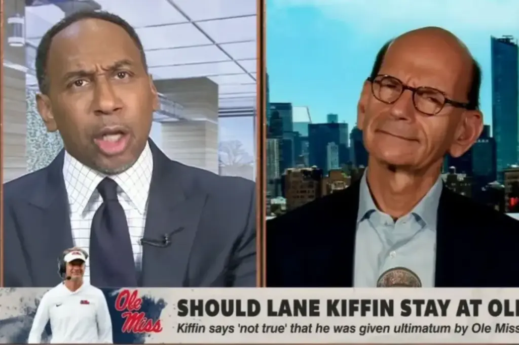Paul Finebaum criticizes Stephen A. Smith for turning the Lane Kiffin debate into a 'racial' issue.