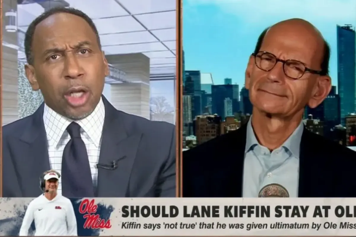 Paul Finebaum criticizes Stephen A. Smith for turning the Lane Kiffin debate into a 'racial' issue.