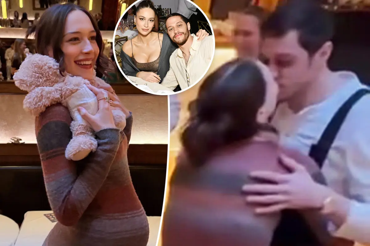 Pete Davidson and Elsie Hewitt share a kiss during their baby shower