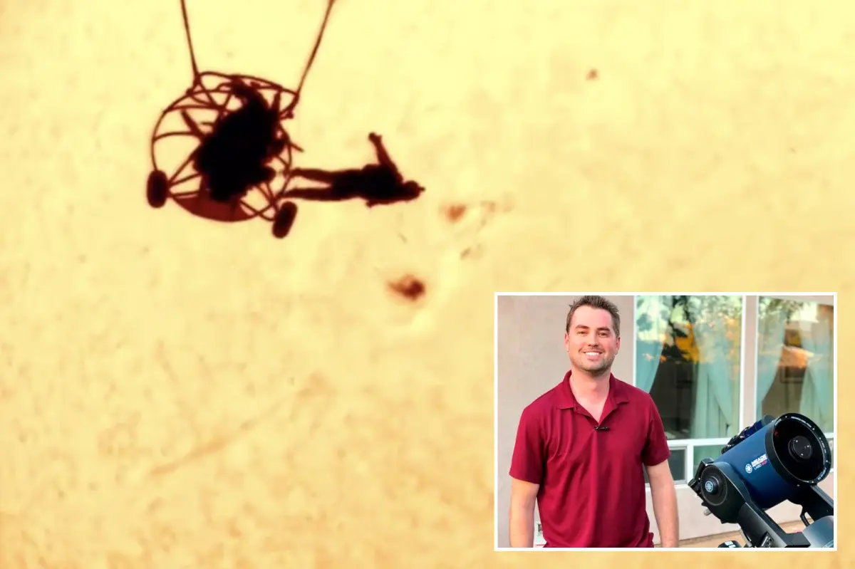 Photographer pictures skydiver in front of the sun