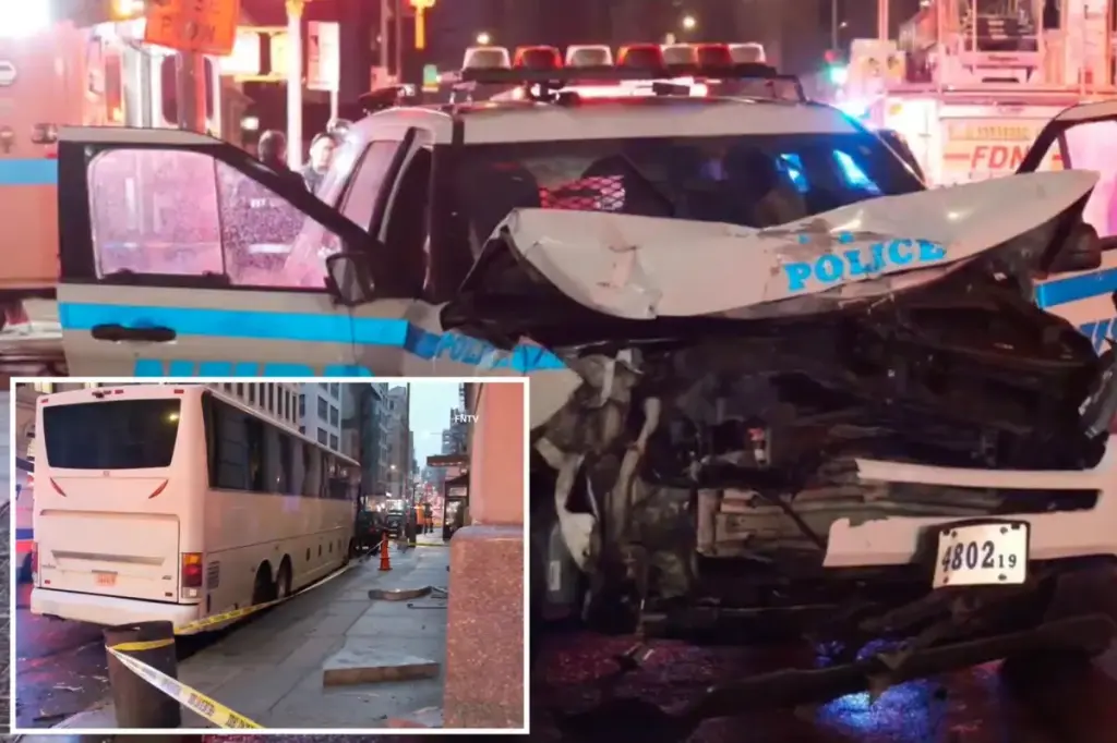 Police SUV collides with bus, pushing it into a parked truck and hotel.