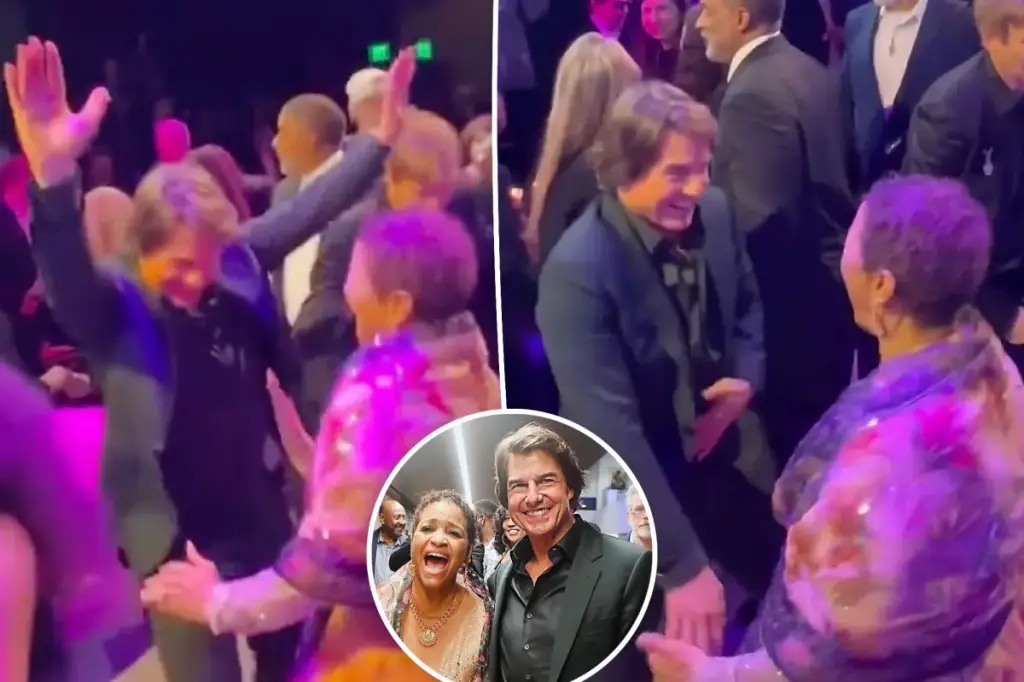 See Tom Cruise enjoy himself and dance in honor of Debbie Allen receiving her honorary Oscar.