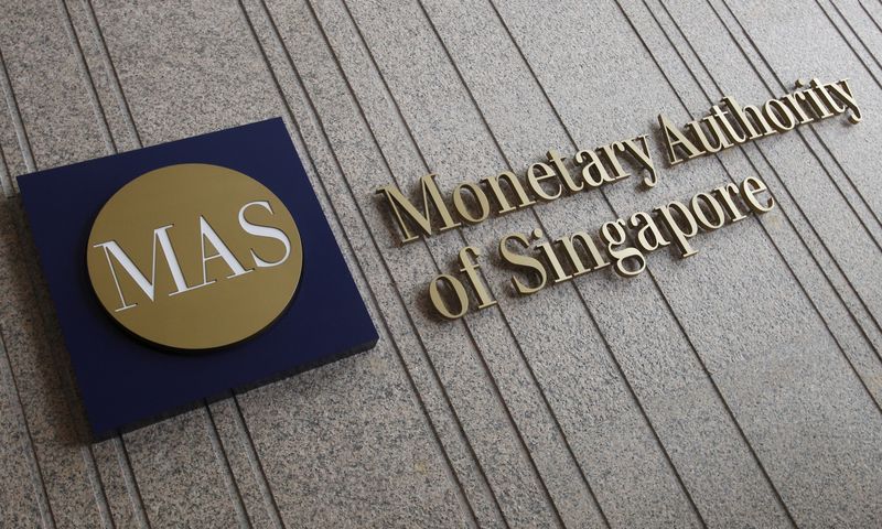 Singapore plans to test tokenized bills and introduce stablecoin regulations, according to the central bank chief.