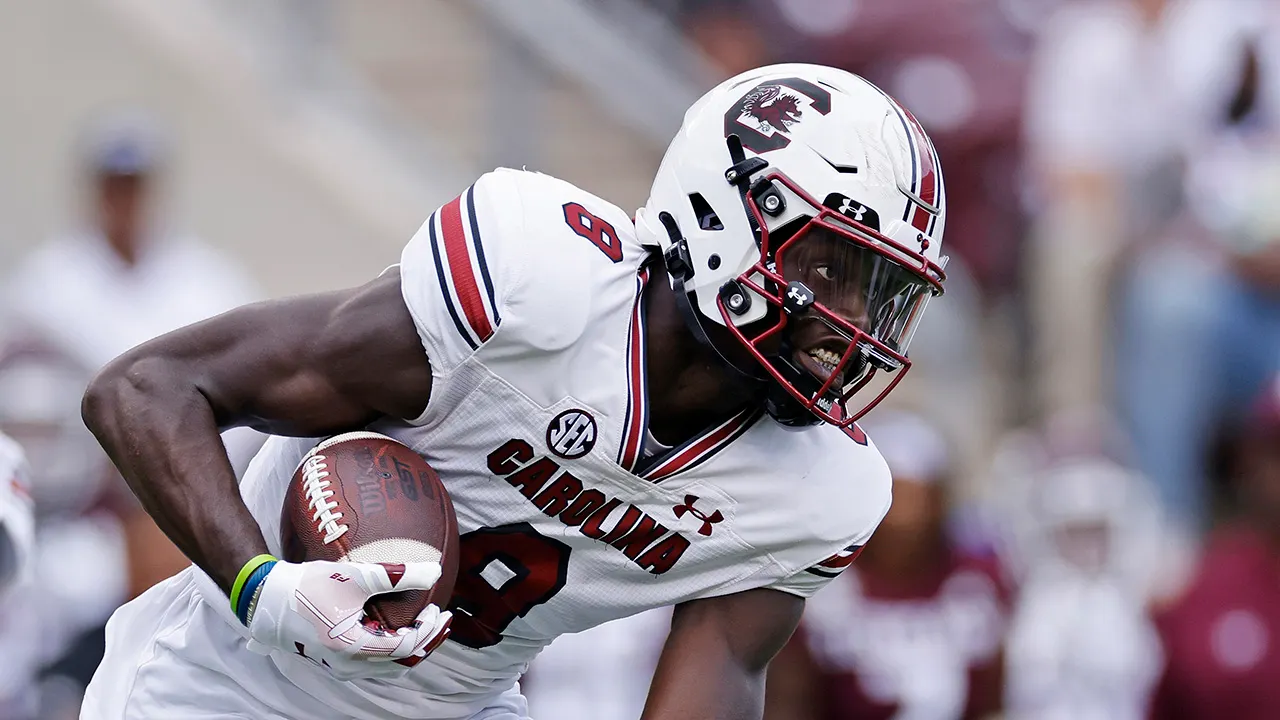 South Carolina player approached by officer following 80-yard touchdown.